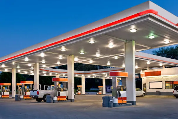 Fuel station forecourt at dusk